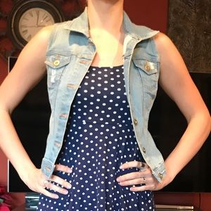 Blue denim trucker vest